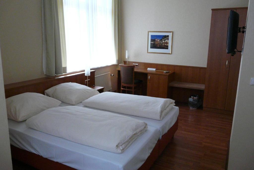 Traveller Hotel Lübeck Pokoj fotografie